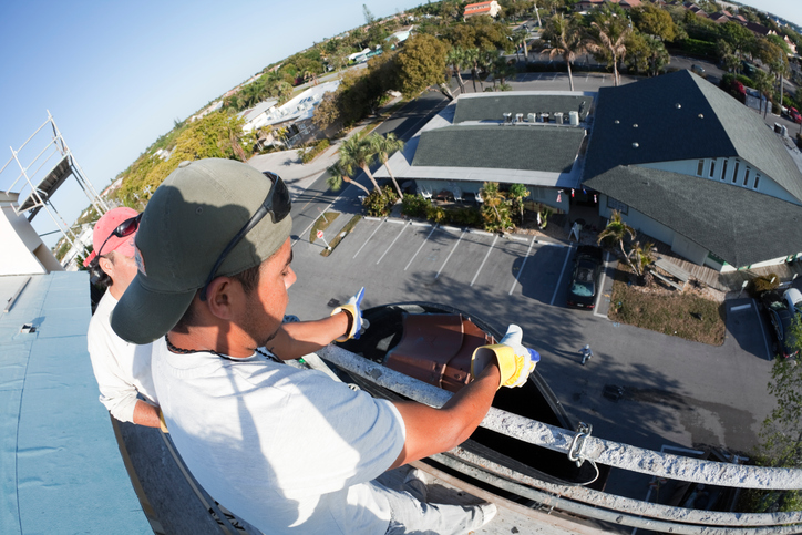 Tearing off commercial flat roof rock